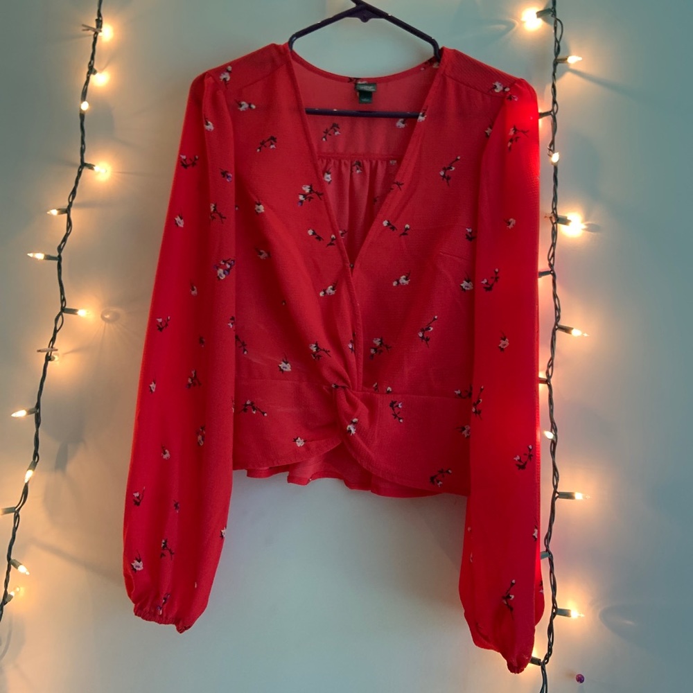 Red floral blouse